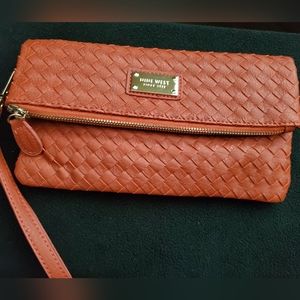Fold over clutch bag.